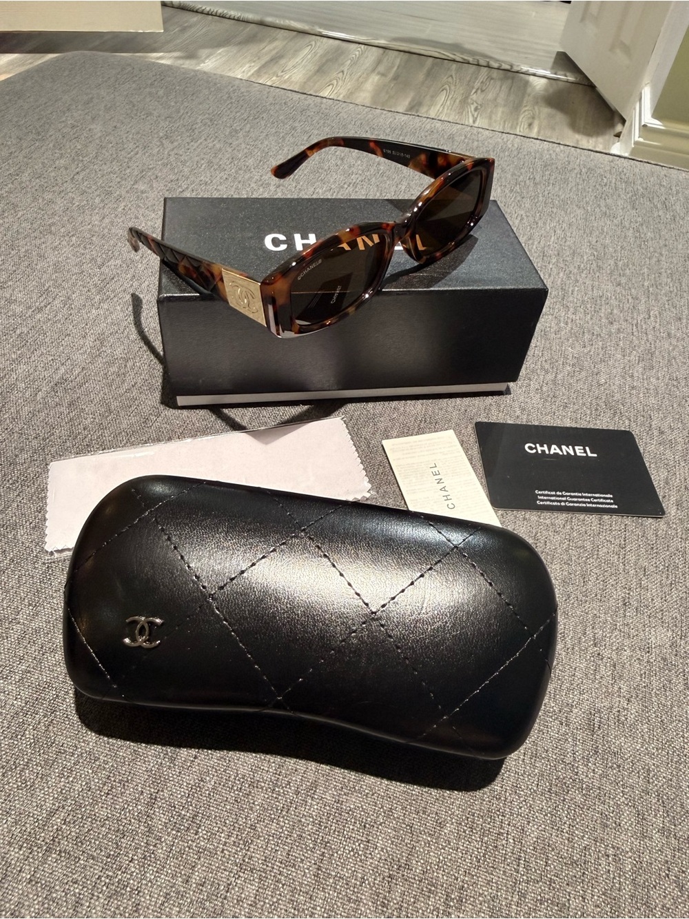 CHANEL Tortoiseshell Sunglasses with Gold Logo Temples